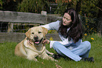young woman with Labrador