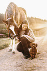 woman with Hanoverian and Havanese