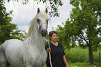 woman and Lipizzaner