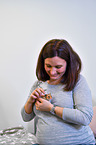 woman with Golden Hamster