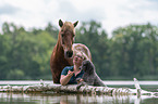 woman with Islandic horse and poodle
