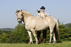 man with horse and pug