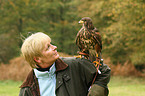 woman and Harris hawk