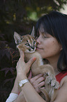 woman and desert lynx