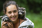 woman with young raccoons