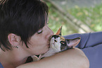 woman and Devon Rex