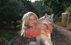 girl with domestic cat