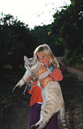 girl with domestic cat