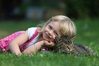 child and domestic cat