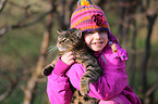 girl and domestic cat