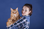 woman and Maine Coon