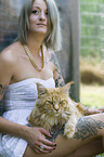 woman with Maine Coon