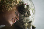 woman with Egyptian-Mau-British-Shorthair