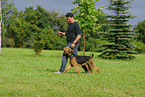 man and Airedale Terrier