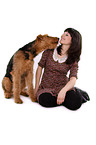 young woman with Airedale Terrier