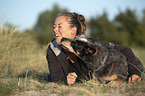 woman and Australian Cattle Dog