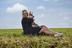 young woman with Australian Cattle Dog puppy