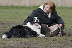 woman with Australian Shepherd