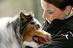 woman and Australian Shepherd