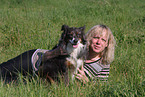 woman and Australian Shepherd