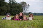 family with Australian Shepherds