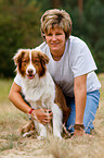 woman and Australian Shepherd