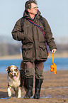 man and Australian Shepherd