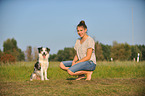 woman and Australian Shepherd
