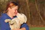 woman and Australian Shepherd Puppy