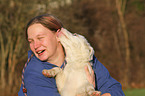 woman and Australian Shepherd Puppy