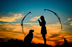 woman and Australian Shepherd