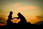 woman and Australian Shepherd