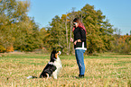 woman with Australian Shepherd