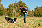 woman with Australian Shepherd