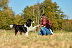woman with Australian Shepherd