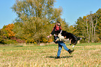 woman with Australian Shepherd
