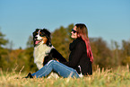 woman with Australian Shepherd
