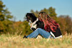 woman with Australian Shepherd
