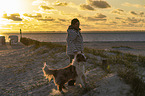 woman and Australian Shepherd