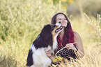 woman with Australian Shepherd