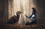 woman with Australian Shepherd