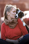 woman with Australian Shepherd