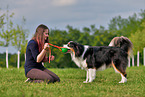 woman with Australian Shepherd