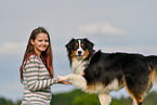 woman with Australian Shepherd