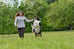 woman with Australian Shepherd
