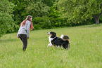 woman with Australian Shepherd