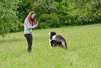 woman with Australian Shepherd