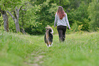 woman with Australian Shepherd