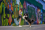 woman with Australian Shepherd