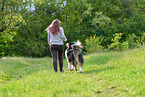 woman with Australian Shepherd